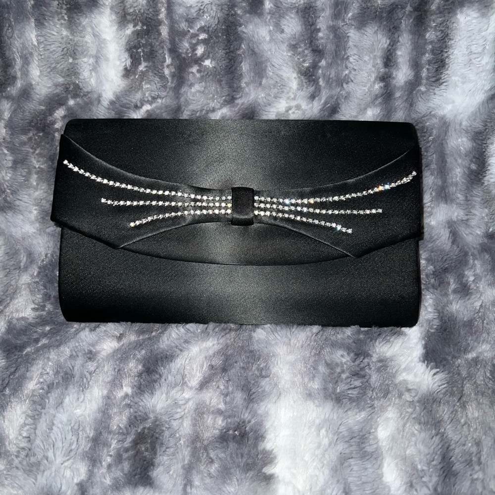 Dyed black evening clutch with strap